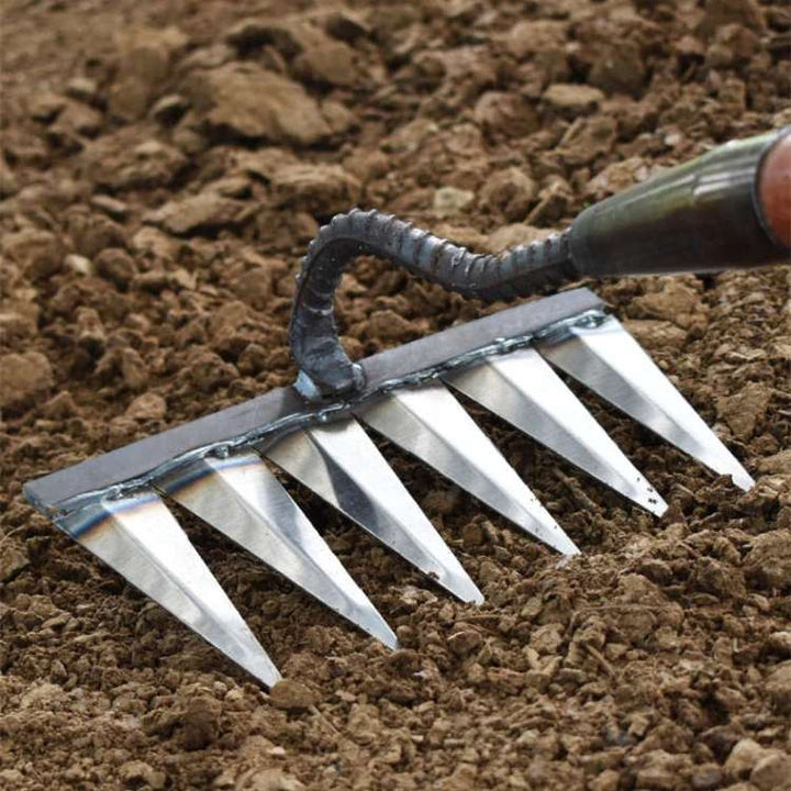 Durable steel garden rake, perfect for efficient weeding & general gardening tasks.