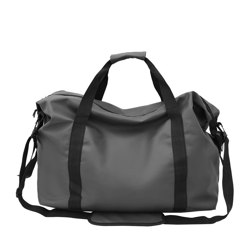 Spacious waterproof duffel bag, heavy-duty for outdoor sports, gym, and adventure travel. Unisex, durable luggage.