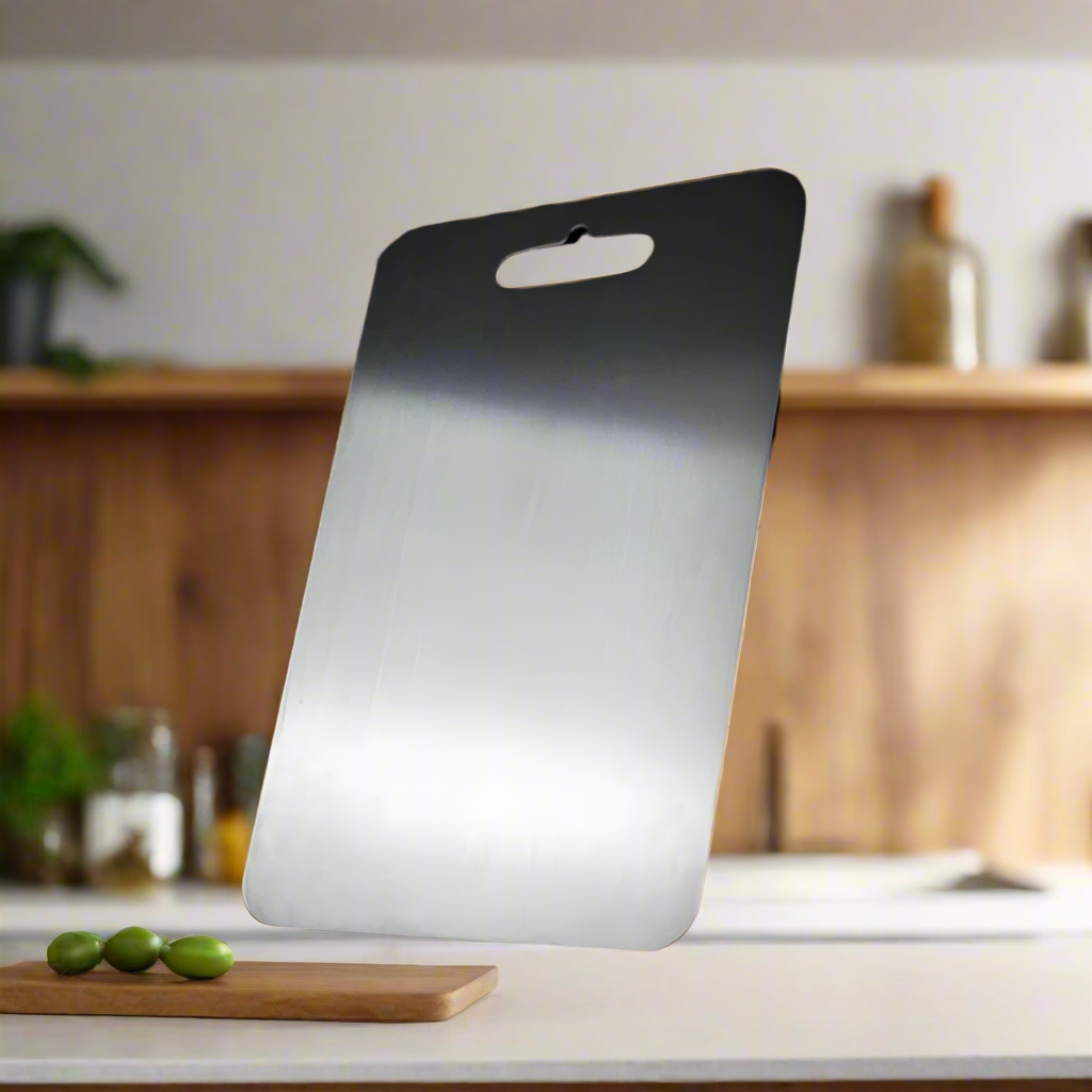 Hygienic titanium cutting board for safe, durable kitchen food preparation.