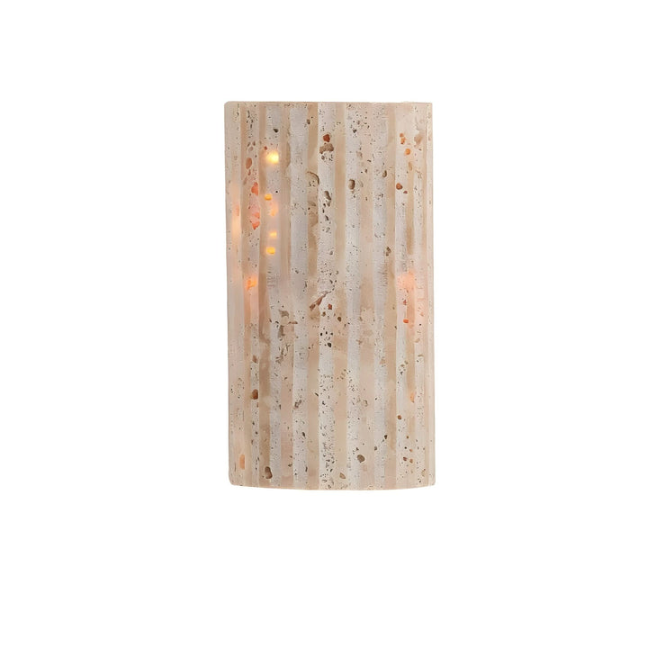 Home lighting: indoor wall sconce with a textured surface & soothing warm LED illumination.