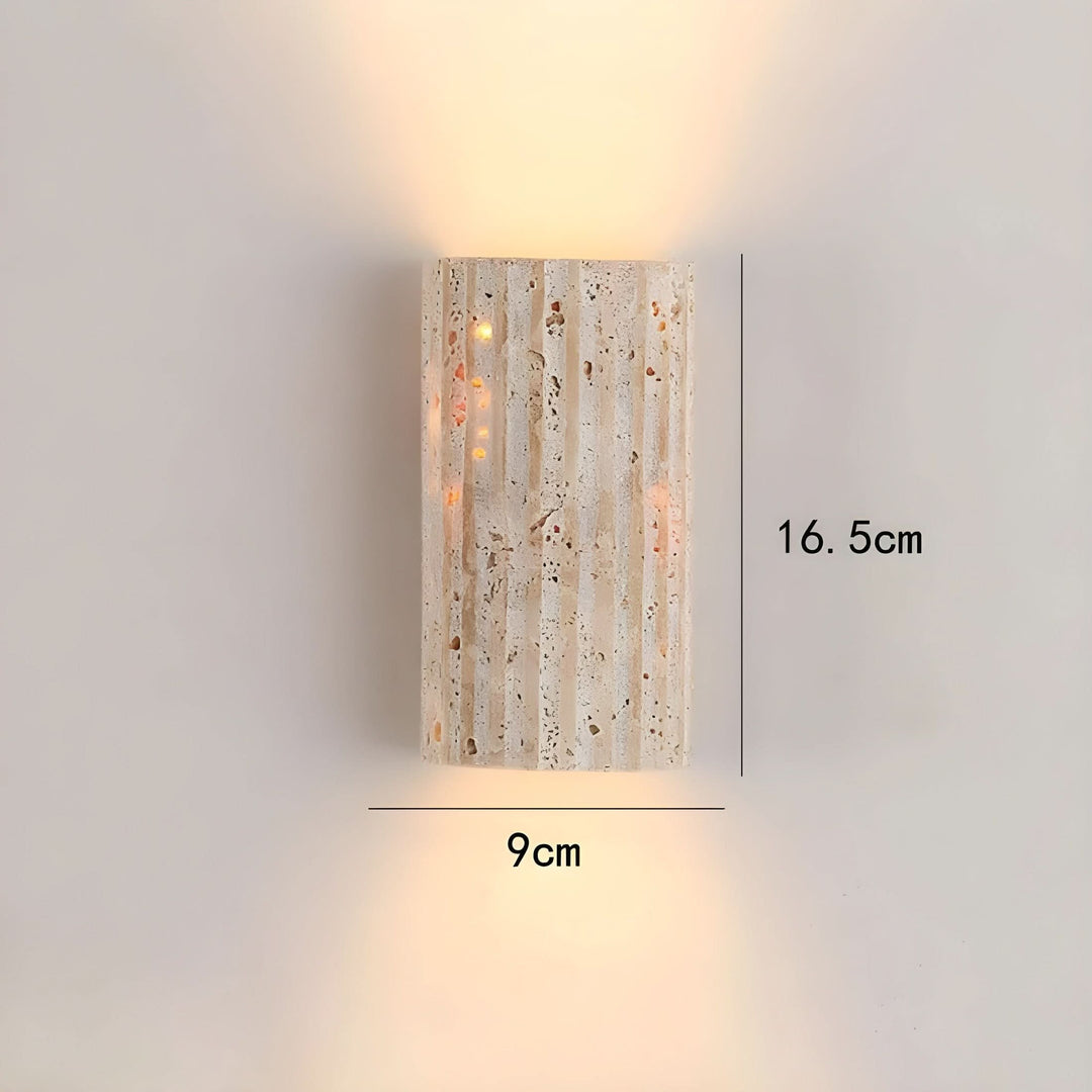 Warm white LED indoor wall sconce, unique textured modern design for ambient home lighting.
