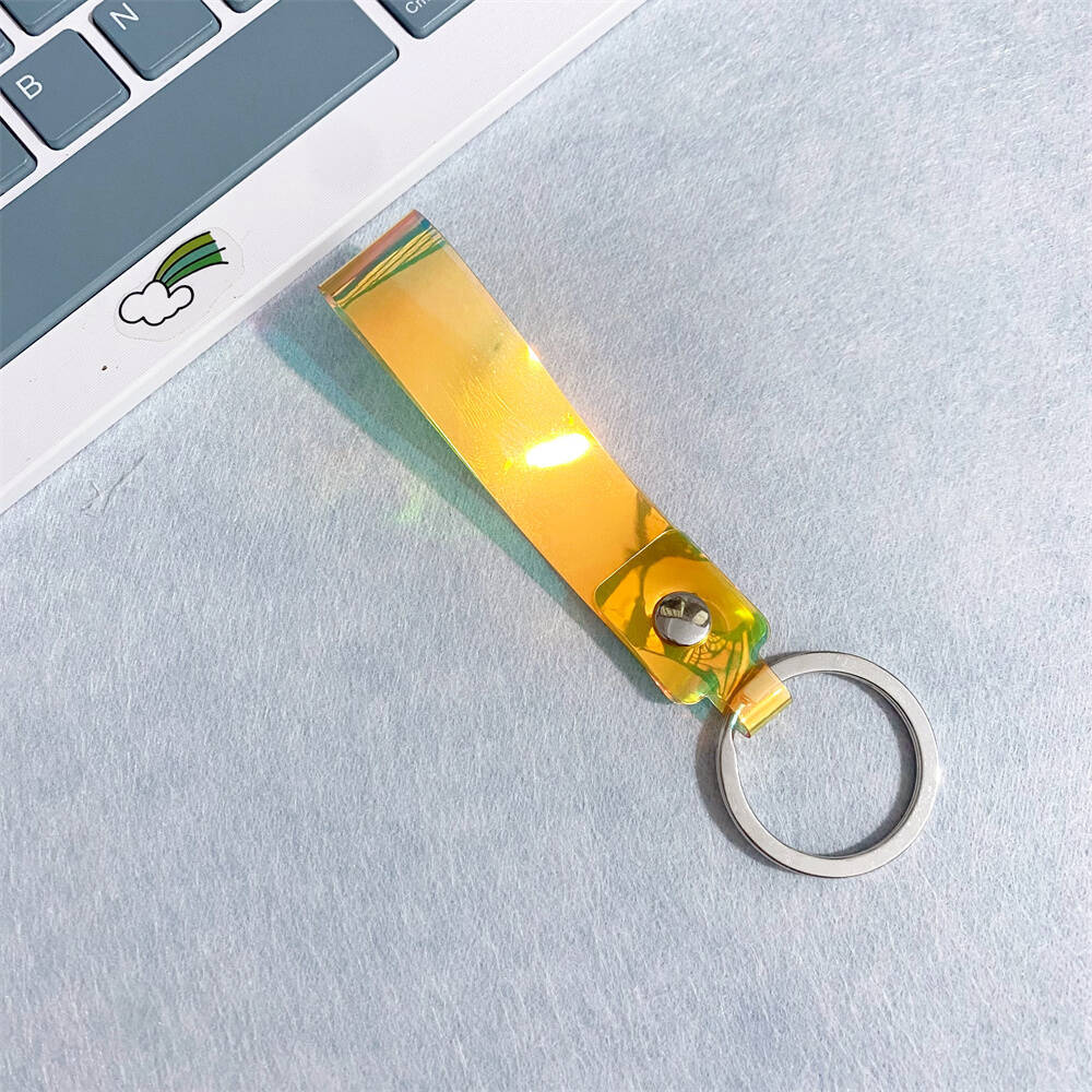 Colorful iridescent acrylic keychain, perfect as a vibrant gift accessory.