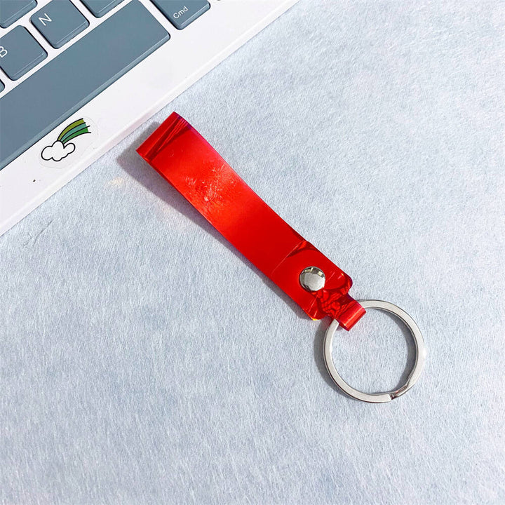 Acrylic iridescent keychain, a playful and colorful accessory for any bag.