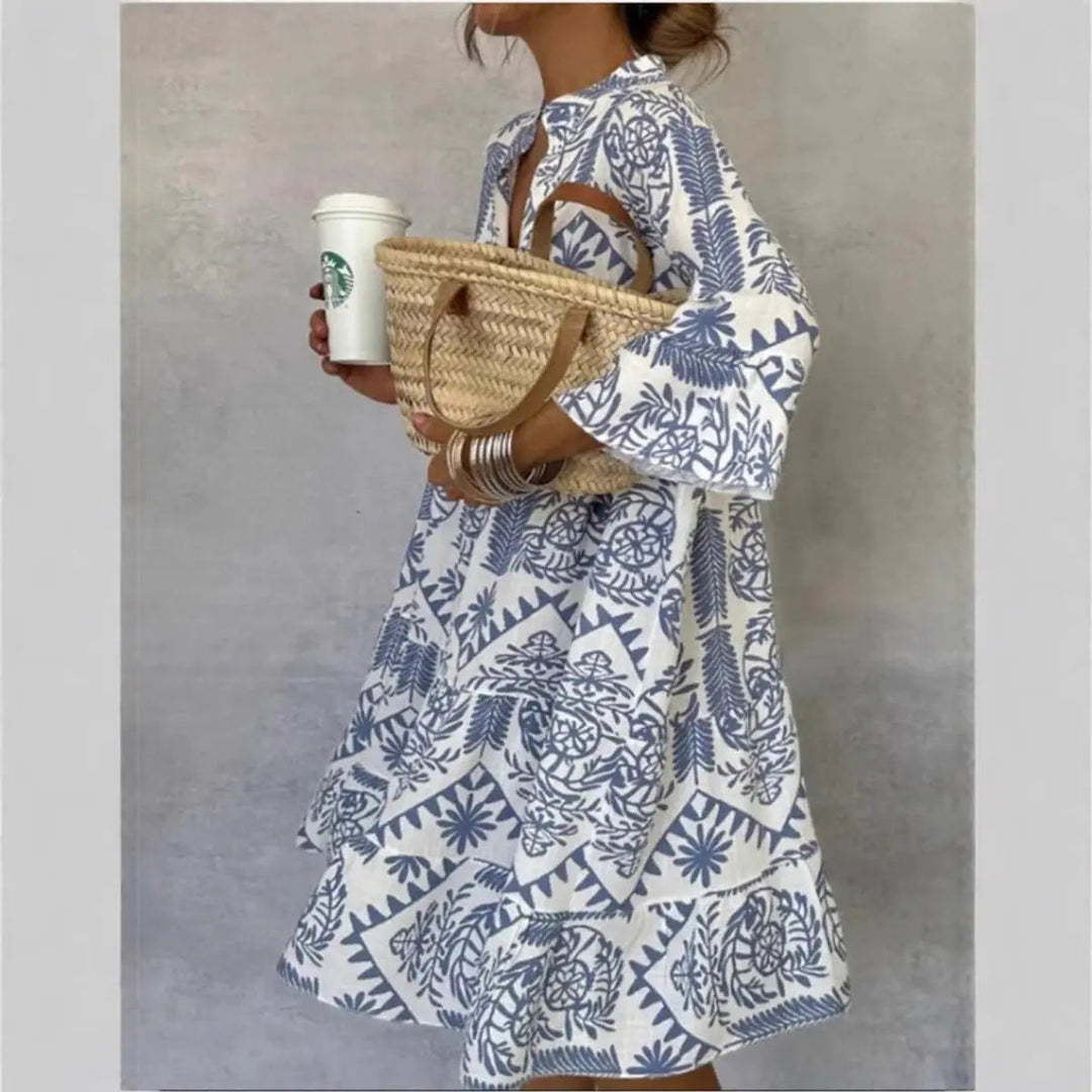 Isla women's loose fit floral tunic dress with botanical print. Ideal for summer casual style or a beach cover-up.