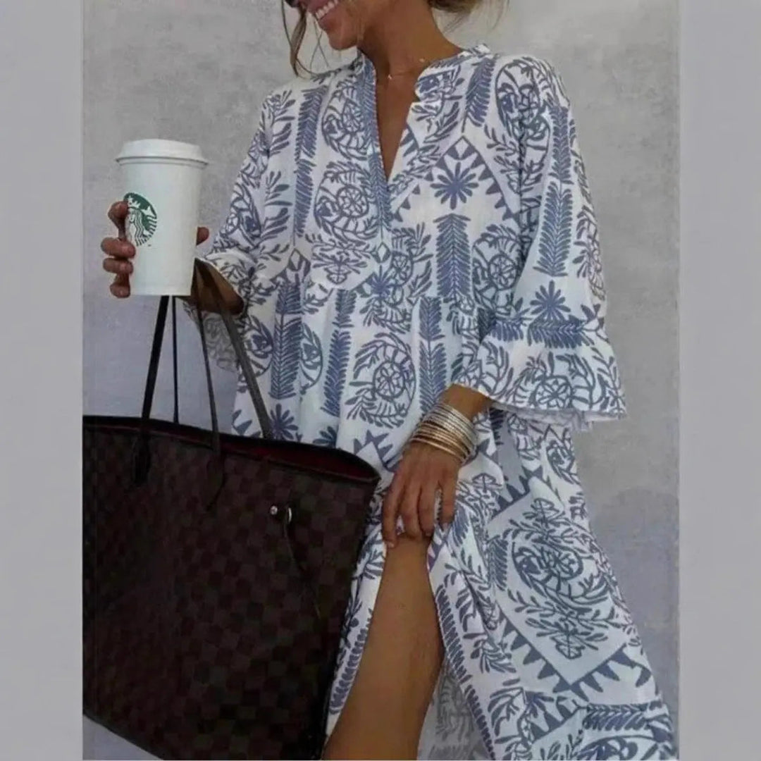 Casual Isla women's floral tunic dress, loose fit botanical print. Versatile summer style, comfortable and chic.