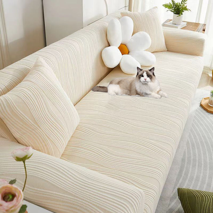 Washable jacquard sofa cover, easy-to-install, offering pet-friendly protection for living rooms.
