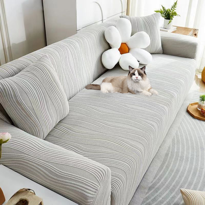 Soft jacquard stretch sofa cover, full coverage furniture protector for pets & kids in living rooms.