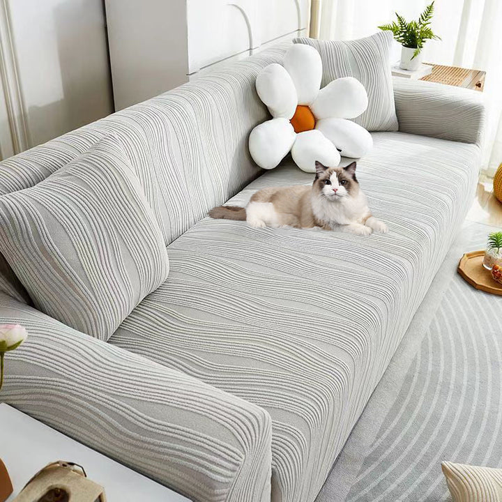 Soft jacquard stretch sofa cover, full coverage furniture protector for pets & kids in living rooms.