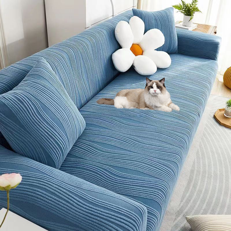 Durable jacquard sofa slipcover, stretch fit for various sofas, enhancing living room decor.