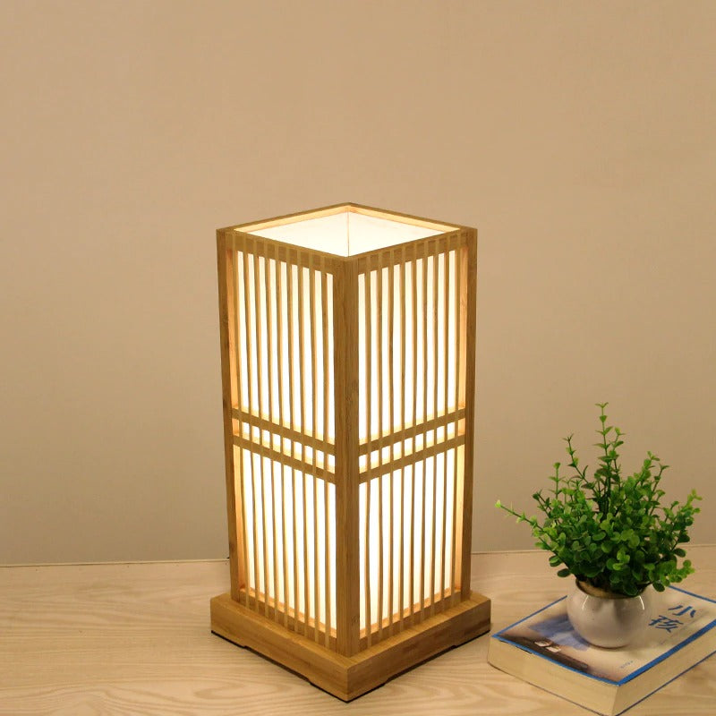 Tatami style table lamp, ideal bedside light. Bamboo shade offers soft, natural lighting for home accent.