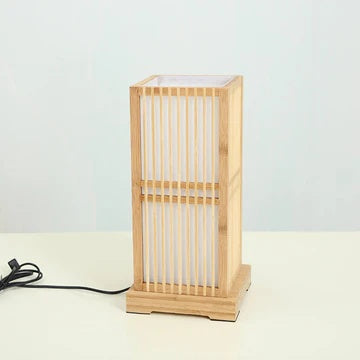 Minimalist Japanese bamboo table lamp, bringing zen decor and natural lighting to any room.