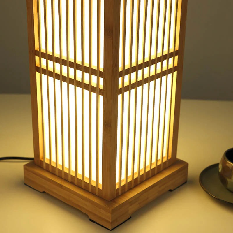 Decorative Japanese table lamp. Bamboo shade creates a warm, natural light for tatami style zen ambiance.