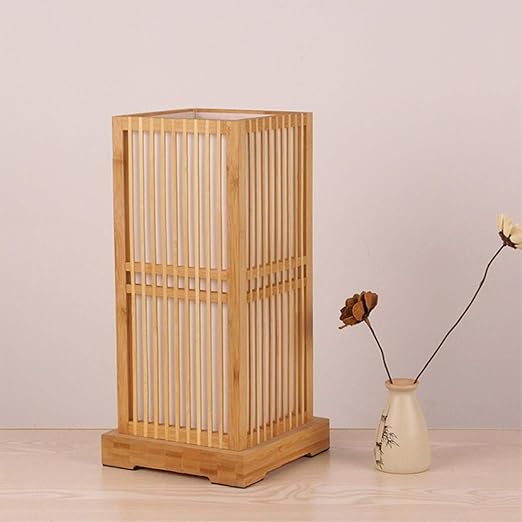 Stylish Japanese table lamp with a natural bamboo shade, ideal for zen decor or a bedside light.