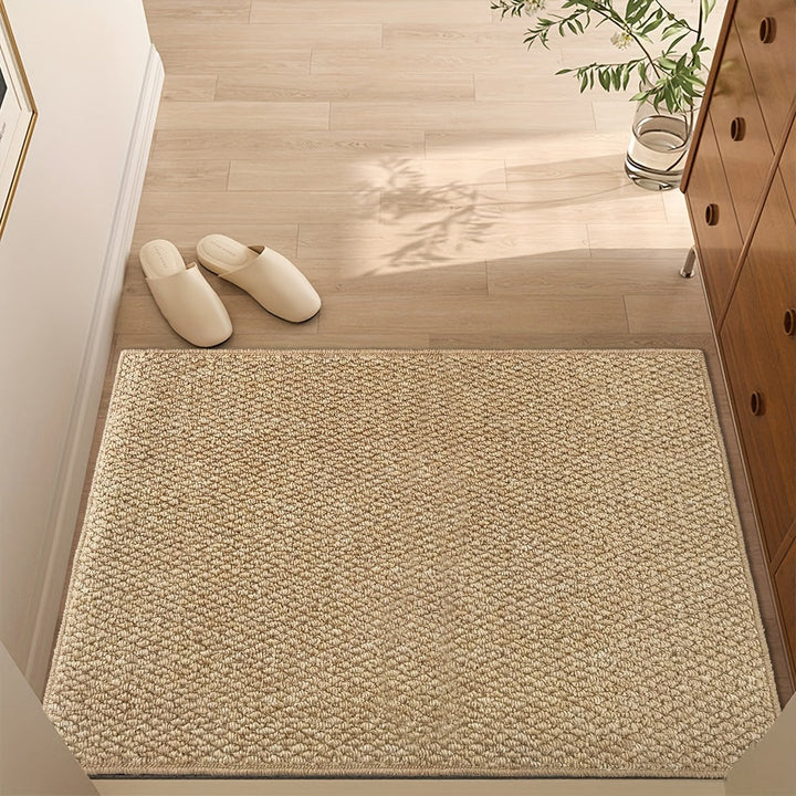 Weather-resistant jute-look outdoor mat. Durable, absorbent, non-slip door mat for porches.