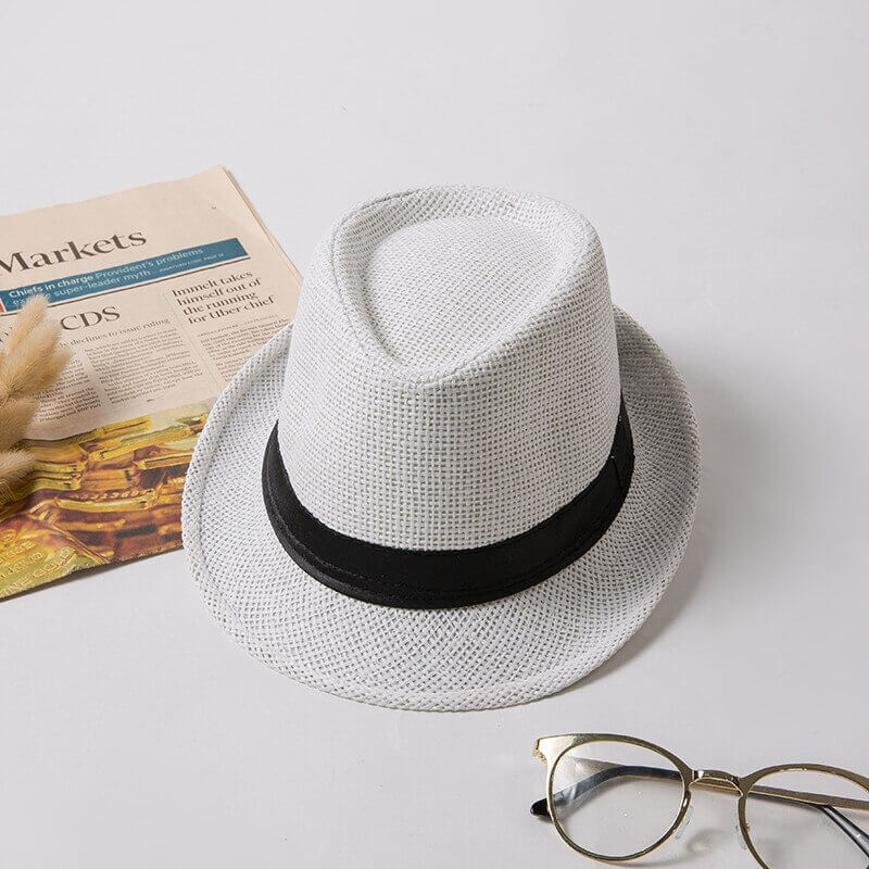 Beige lightweight trilby summer hat, classic unisex style, ideal for sun protection on the go.