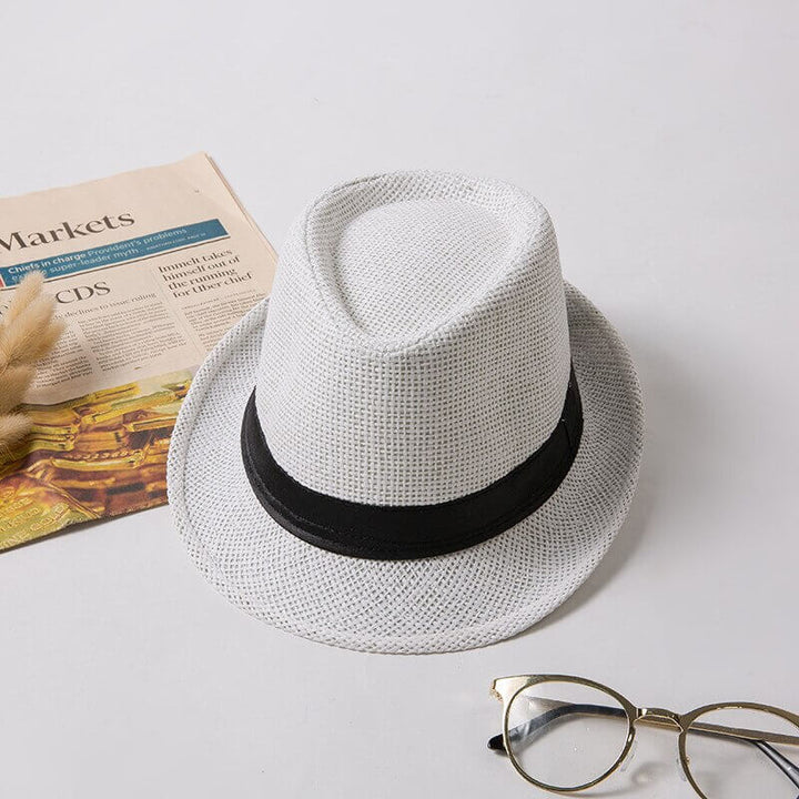Beige lightweight trilby summer hat, classic unisex style, ideal for sun protection on the go.