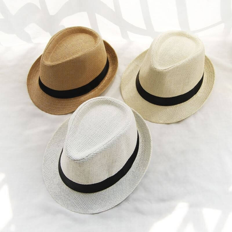 White classic unisex summer trilby hat, lightweight design for comfortable beach and travel use.