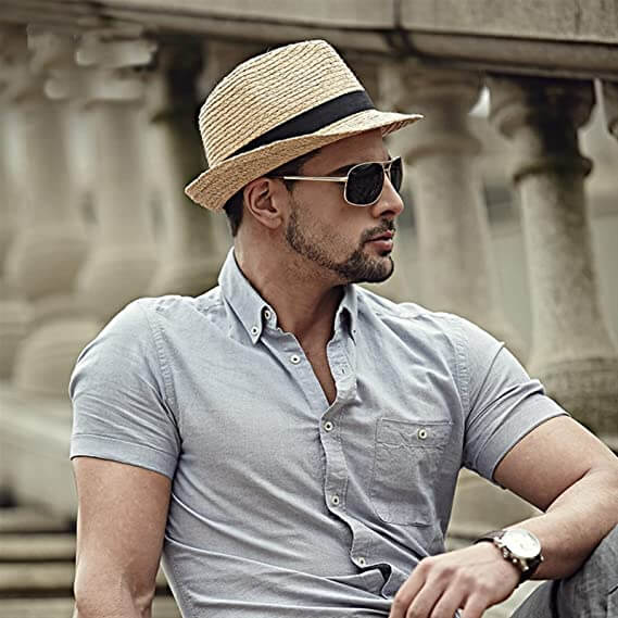 White versatile trilby summer hat, lightweight classic unisex design for beachwear & sun protection.