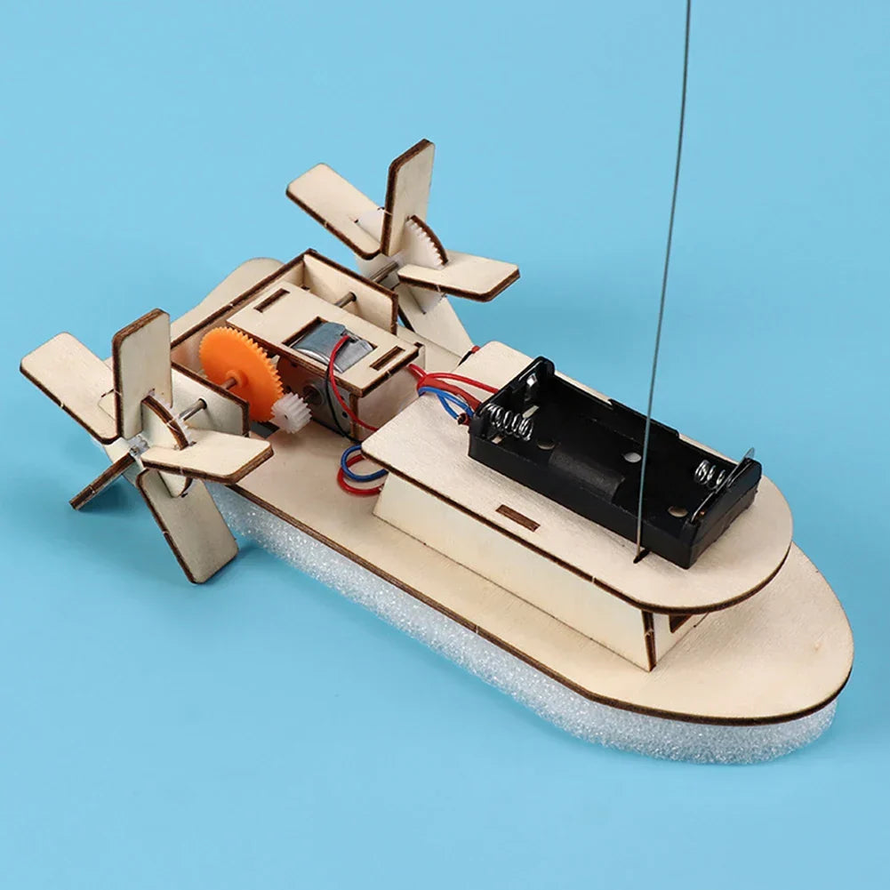 Kids' DIY wooden electric toy boat floating. Fun, educational STEM building kit for children.