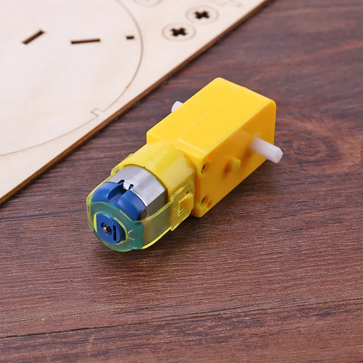 Colorful wooden components for DIY electric toy boat. Engaging STEM kit for kids.
