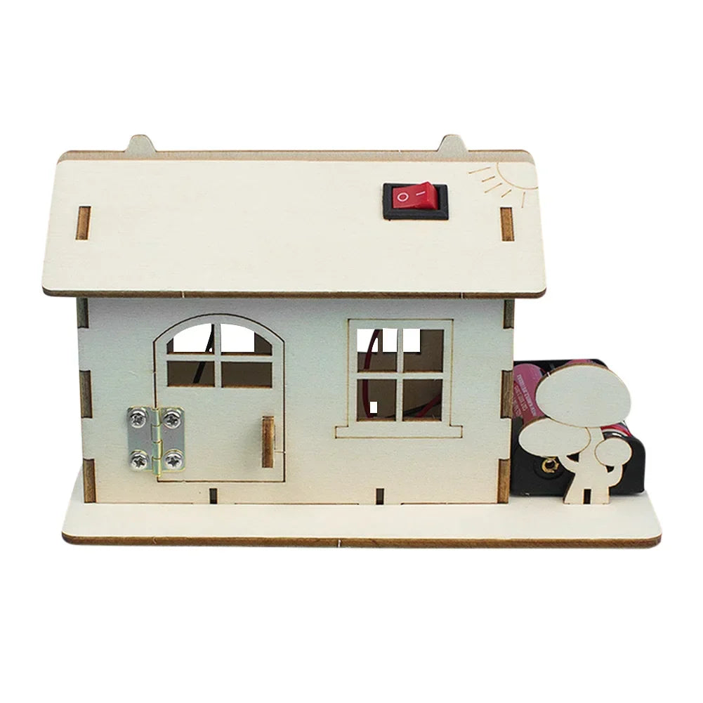 Kids' creative building of a wooden electric toy boat. Hands-on DIY science kit for children.