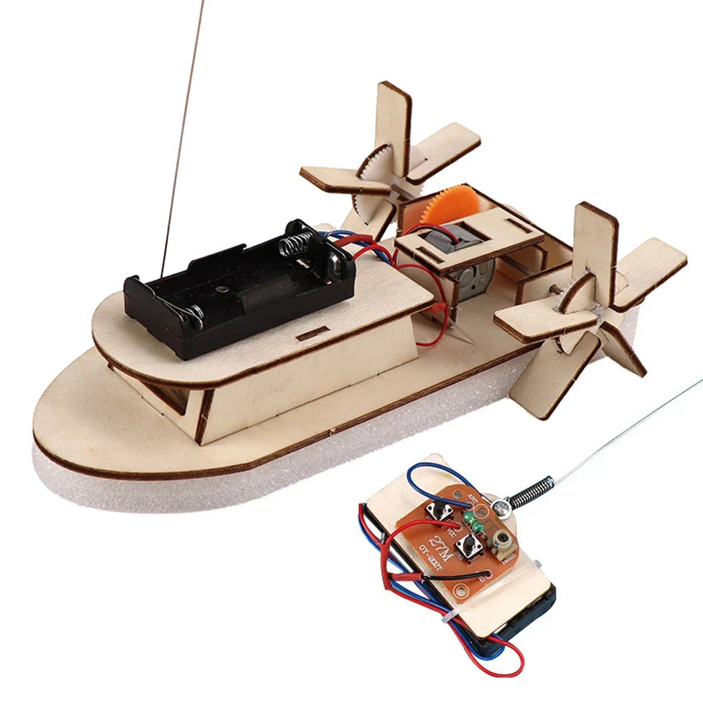 Finished wooden electric boat on a clean background. Educational DIY STEM toy for builders.