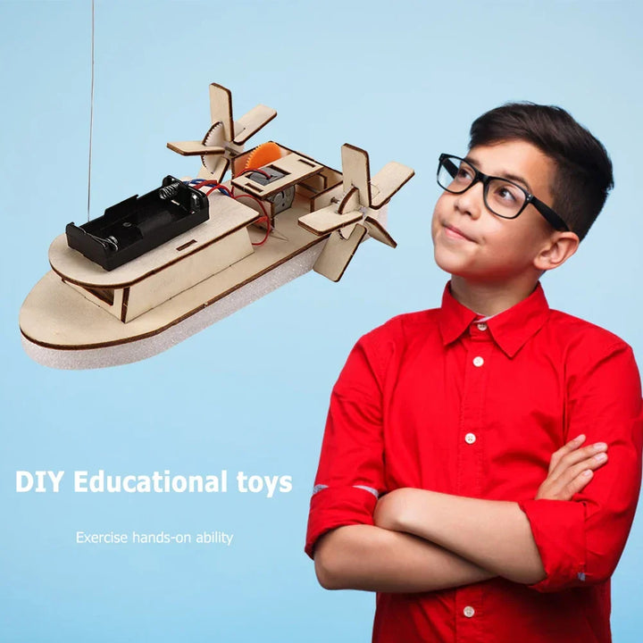 Close-up: unfinished wooden electric toy boat, DIY kit parts. Engaging STEM educational toy.