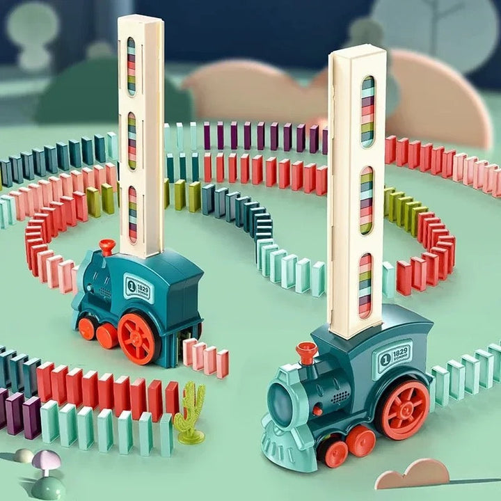 Child plays with Automatic Domino Train, watching it lay a path of vibrant dominoes. Engaging light up & sound toy.