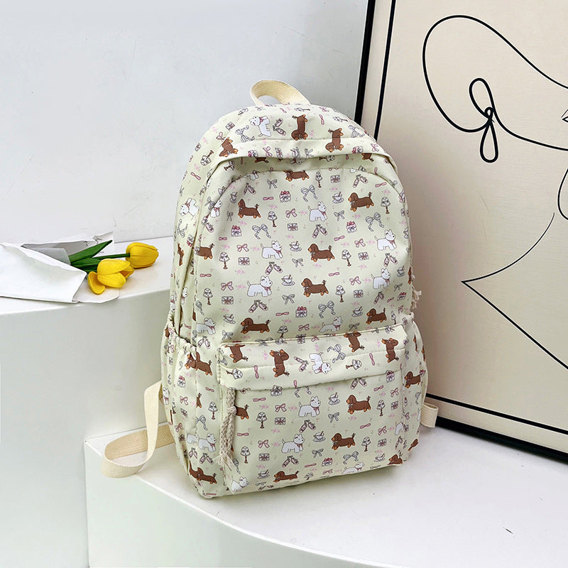 Kids' brown animal print school backpack. Durable, comfortable, and playful design for young students.