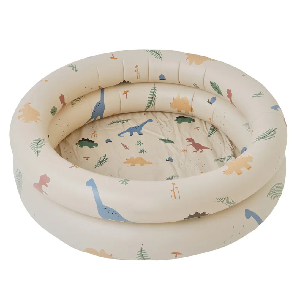 Children joyfully playing in a colorful inflatable splash pool with interactive water toys, perfect for outdoor summer fun.