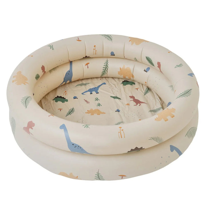 Children joyfully playing in a colorful inflatable splash pool with interactive water toys, perfect for outdoor summer fun.