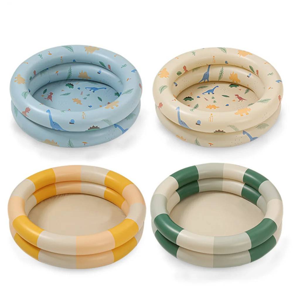 Bright inflatable baby pool featuring a built-in splash pad and water toys, creating an exciting outdoor water play area.