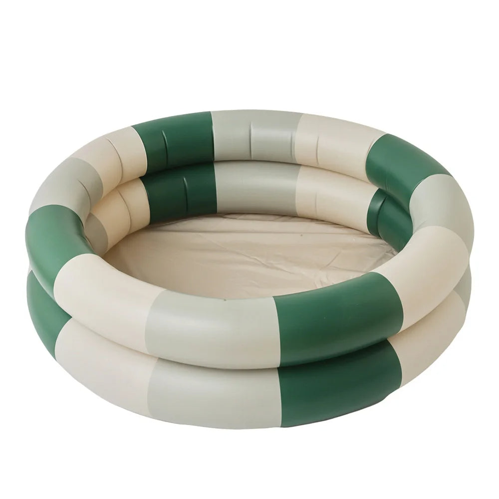 Assortment of fun water play toys inside a durable inflatable splash pool, designed for kids' backyard summer activities.