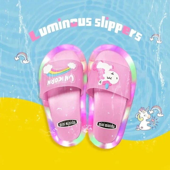 Glowing LED unicorn slippers for kids, magical light-up footwear, ensuring cozy comfort and fun for children.