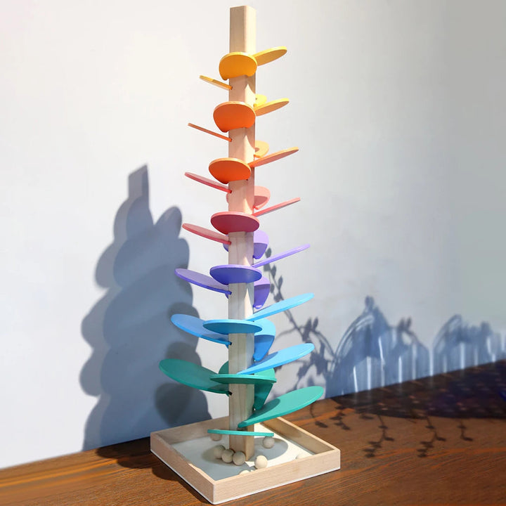 Vibrant wooden rainbow sound tower, an engaging educational toy for kids' sensory and music development.