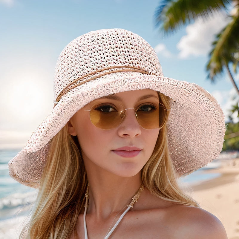 Womens wide brim woven straw sun hat. A stylish foldable beach hat, perfect for summer fashion & UV protection.