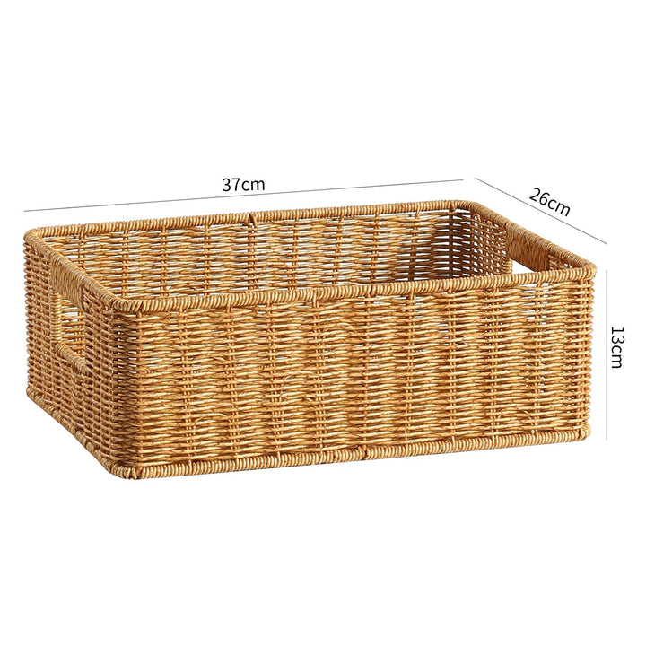 Stylish natural fiber wicker basket, perfect for blankets or towels.