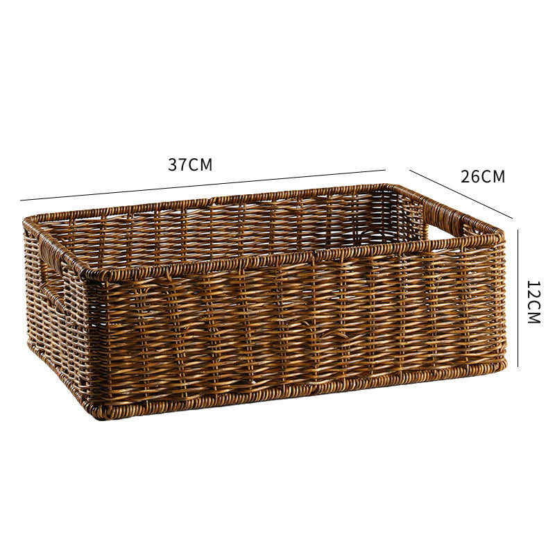 Handcrafted rectangular wicker basket for tidy living room organization.