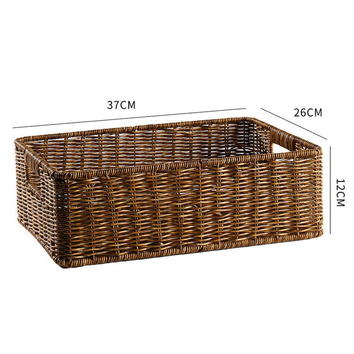 Handcrafted rectangular wicker basket for tidy living room organization.