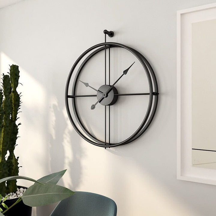 Abstract geometric metal wall clock, a large silent quartz timepiece for modern interiors.