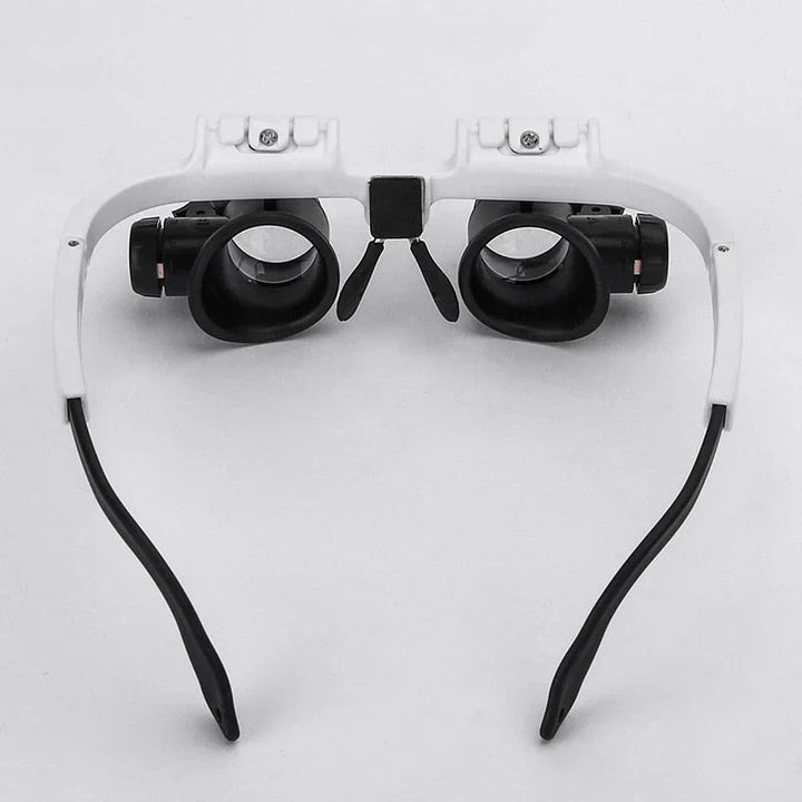 Hands-free LED magnifier for intricate tasks, electronic repair, & detailed craft work. Adjustable lens for clarity.