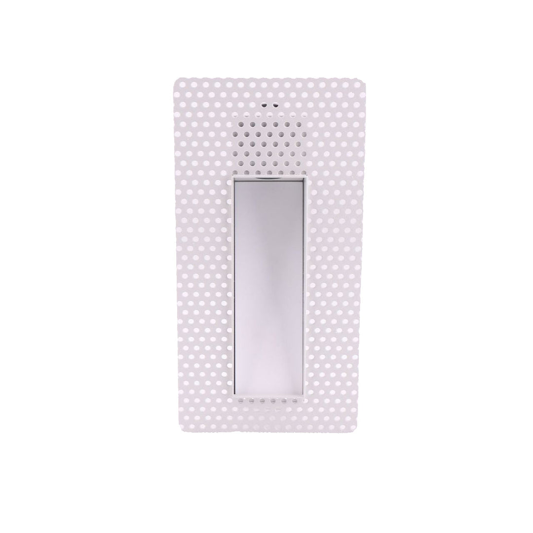 Discreet LED wall light with sensor for subtle illumination in hallways.