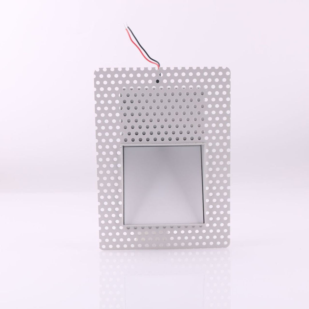 Contemporary LED wall light with integrated motion sensor for indoor use.