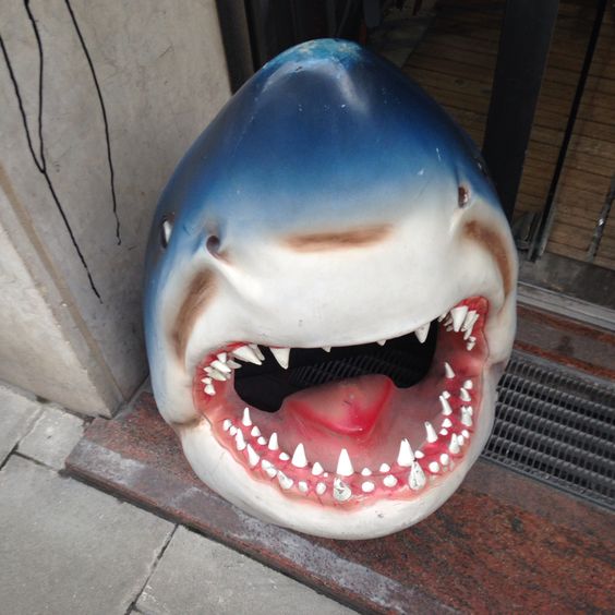 Unique gift: lifelike resin shark outdoor statue, perfect for garden enthusiasts or poolside decor.