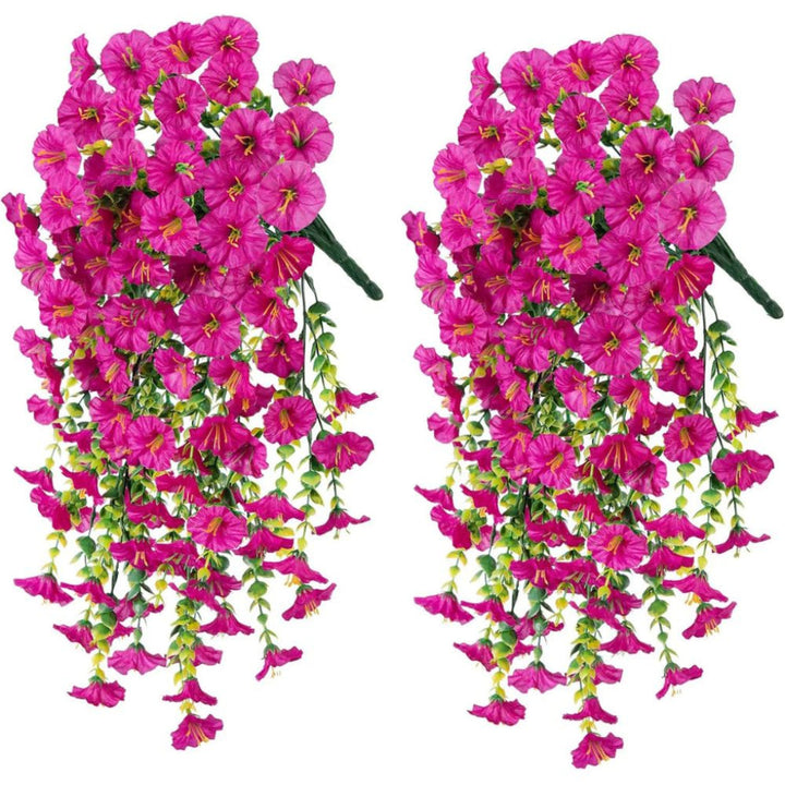 Vibrant pink & purple artificial morning glory garland. Ideal hanging floral decor for weddings & events.