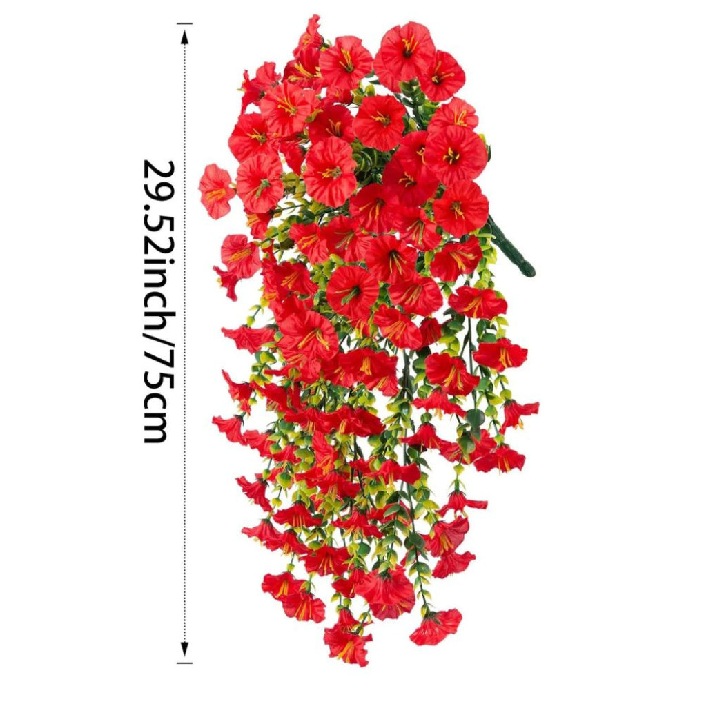 Close-up of lifelike artificial morning glory garland. Realistic pink and purple flowers for home decoration.