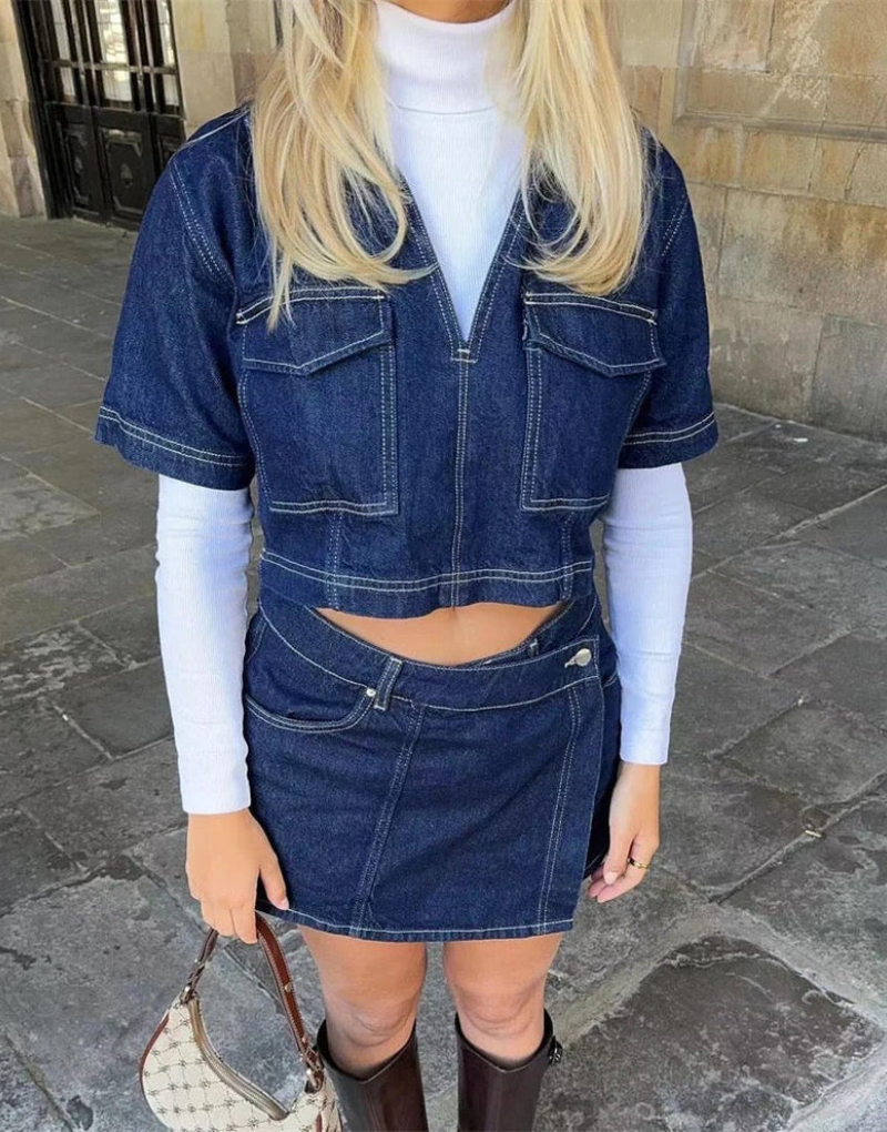 Chic women's denim skort and top set. Effortless two-piece casual wear for stylish summer outfits.