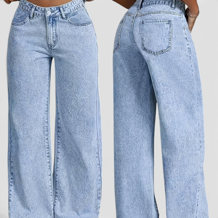 Light blue women's oversized high waist jeans. Versatile baggy wide-leg denim for work, travel & casual comfort.