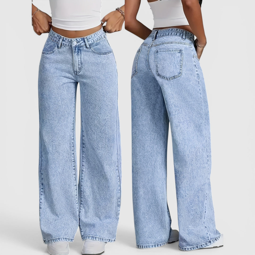 Women's light blue high-waist baggy jeans. Oversized wide-leg denim, ideal for comfortable travel, work, or casual.
