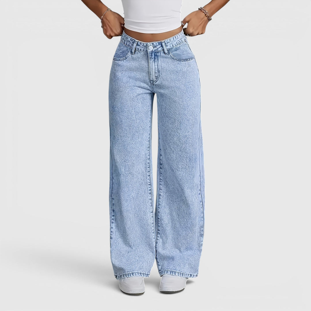 Versatile light blue women's oversized high-waist jeans. Comfortable wide-leg baggy fit for work, travel & everyday.